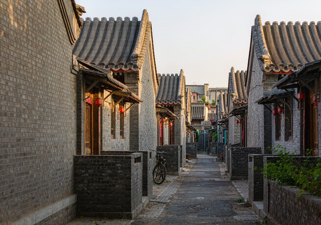A traditional Beijing hutong alley with grey brick courtyards
