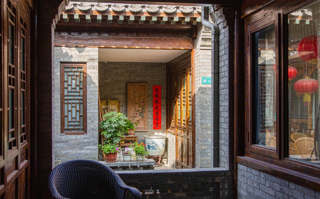 Traditional Beijing hutong courtyard hotel entrance