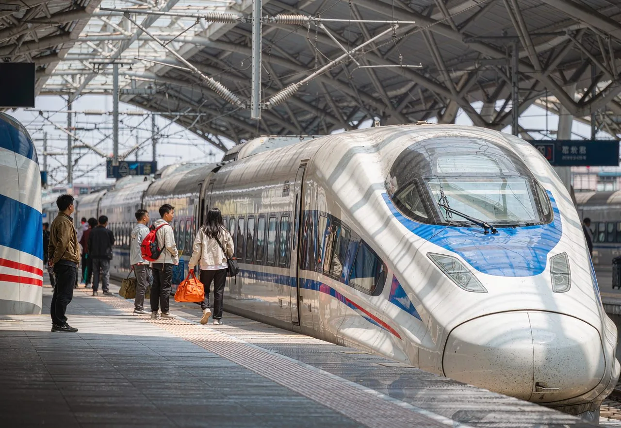 A Fuxing high-speed train at a Chinese station platform
