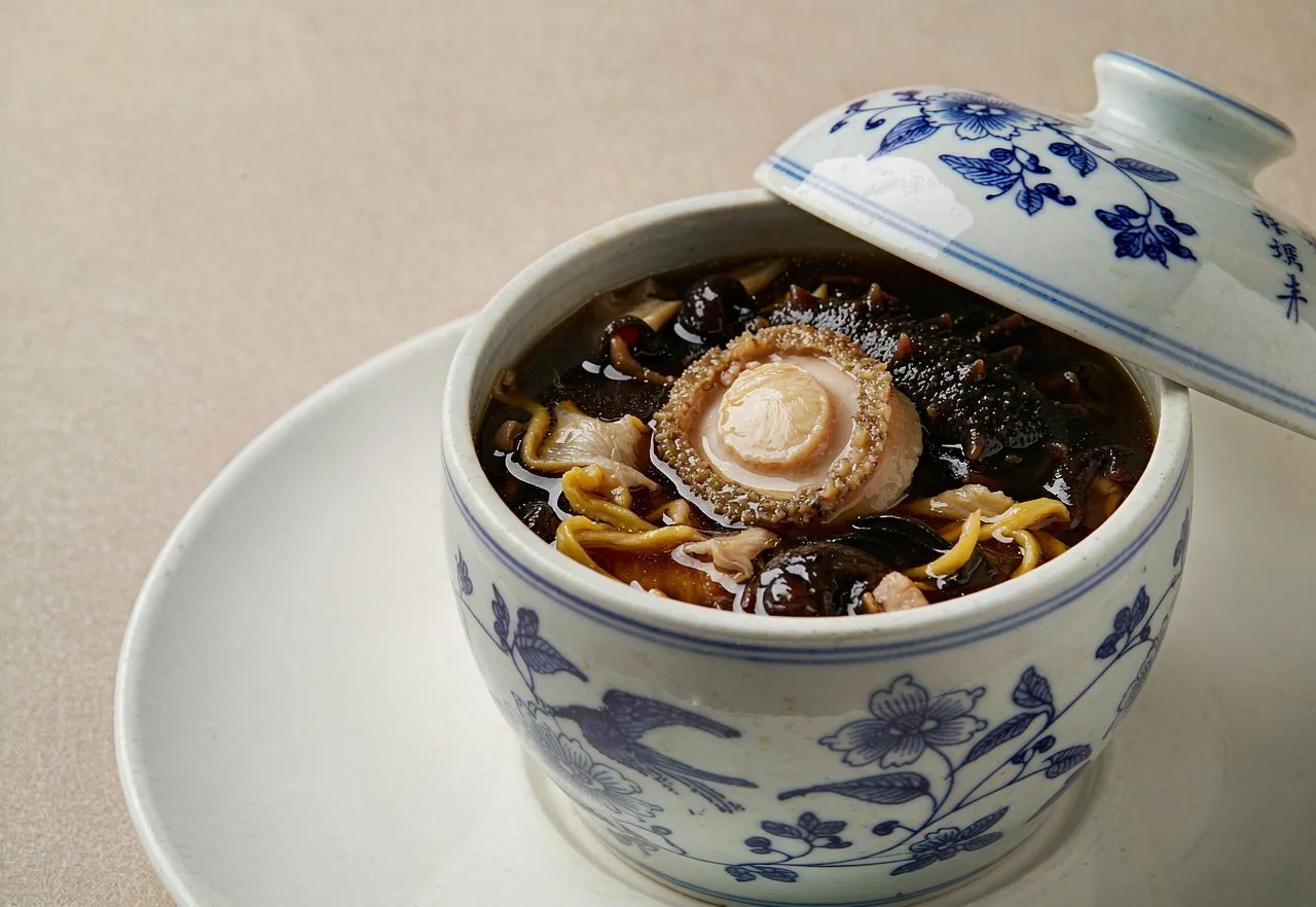 Fujian Buddha Jumps Over the Wall soup in a ceramic jar
