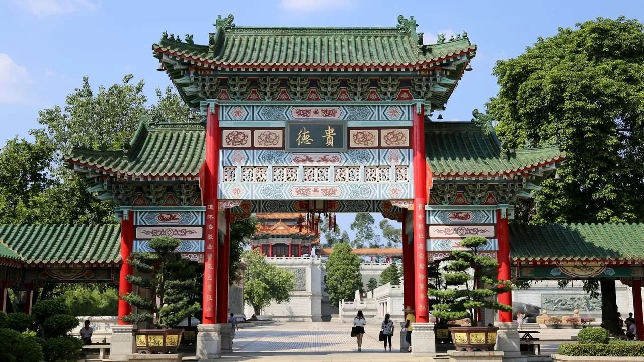 Traditional Chinese temple gate with orange walls