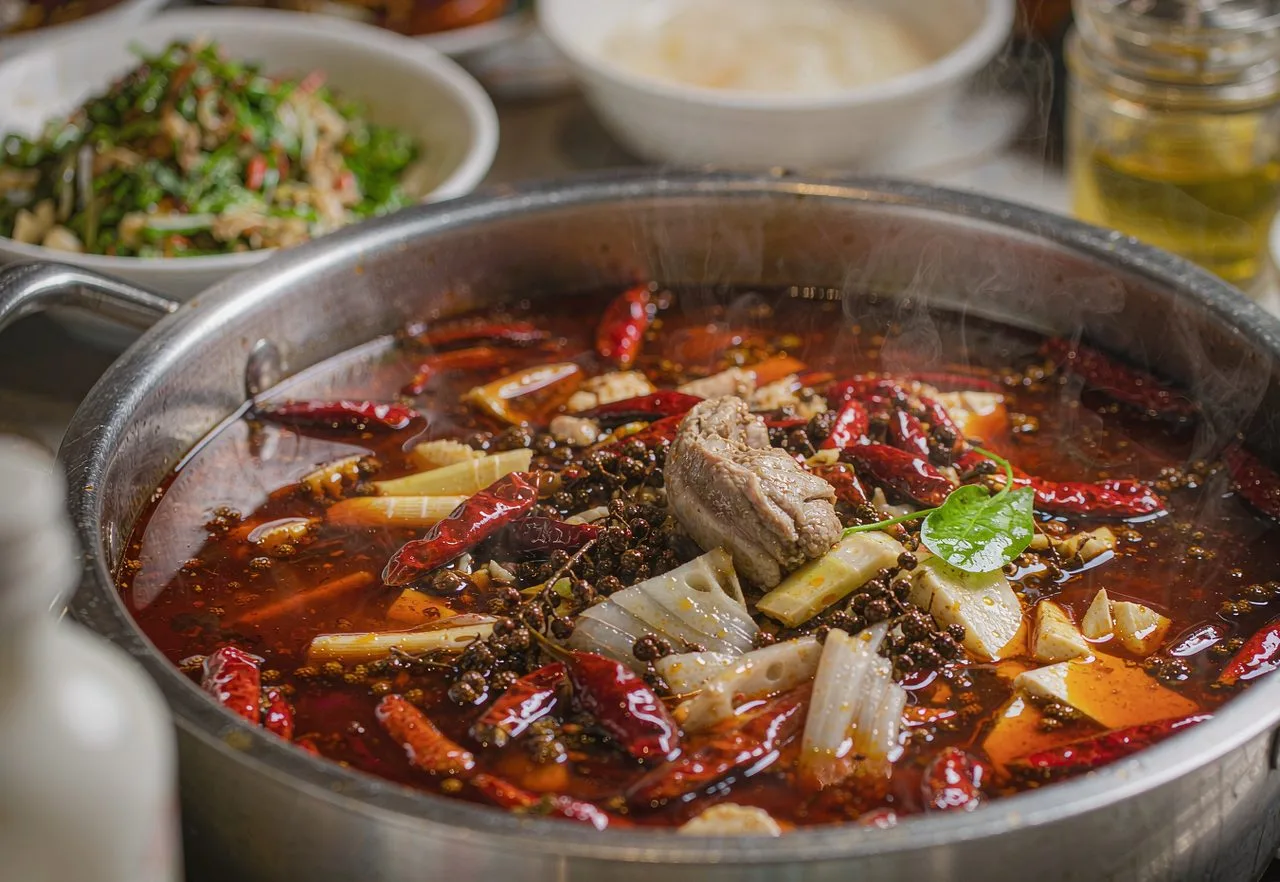 A bubbling Sichuan hot pot with chillies and Sichuan peppercorns