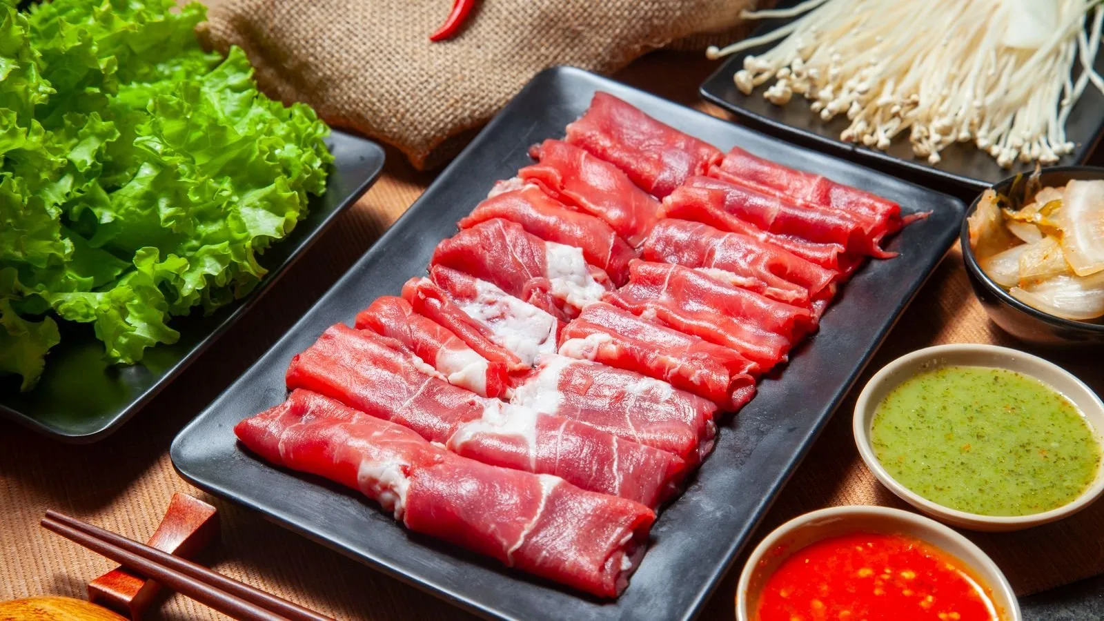 A lavish spread of Chinese hotpot dishes and sides