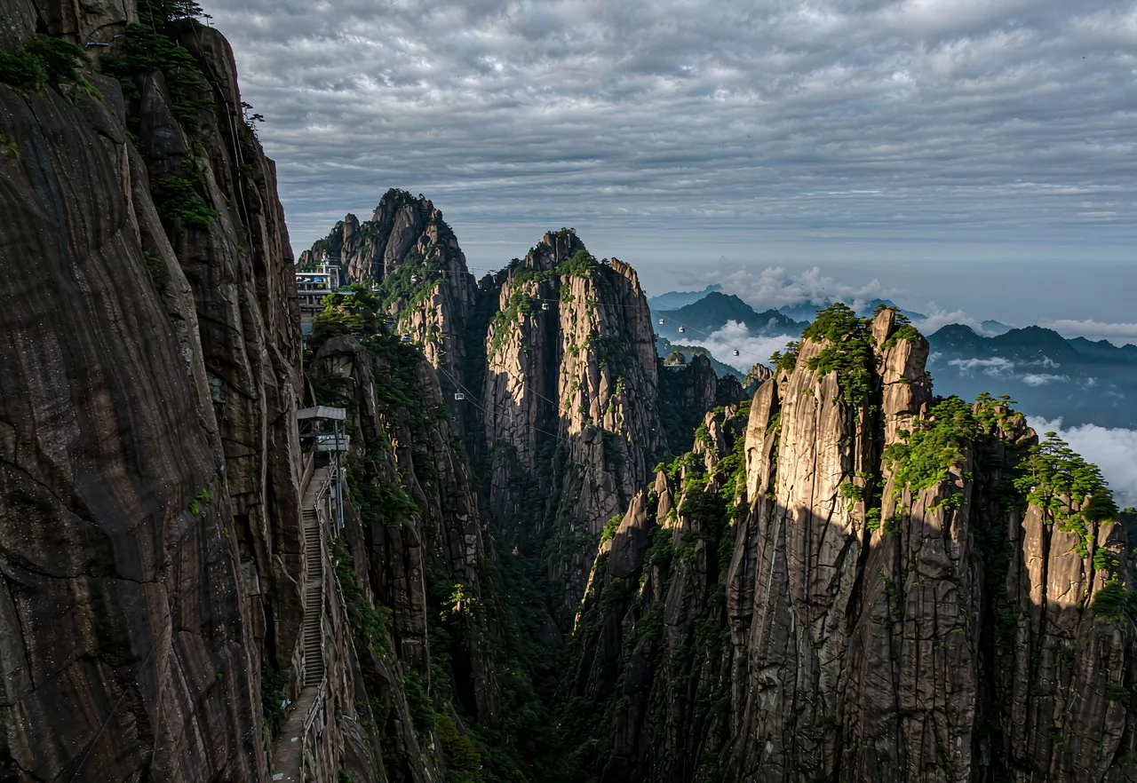Steep granite cliffs and plank path on Mount Huashan